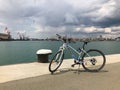 Industrial Black Sea port of Burgas, Bulgaria. Blue and white bicycle of the HEAD company