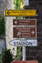 Burgbrohl, Germany - 02 23 2021: road signs to Maria Laach, Glees, Burg OlbrÃÂ¼ck and several routes through Vulanpark