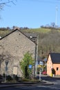 Burgbrohl, Germany - 02 23 2021: Small town street in Burgbrohl transmitter tower on the hill above