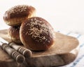 Burger buns ready for a grill with sesame seeds on top Royalty Free Stock Photo