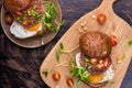 Burger with cherry tomato, green sprout and fried egg Royalty Free Stock Photo