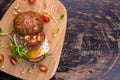 Burger with cherry tomato, green sprout and fried egg Royalty Free Stock Photo