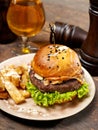 Burger and red beer Royalty Free Stock Photo