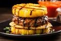 a burger with grilled pineapple and teriyaki sauce