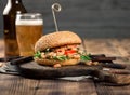 Burger with grilled shrimp and light beer Royalty Free Stock Photo