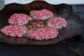 Burger Grilling on Fire.Homemade Hamburgers. Grill Meatballs. Making Hamburgers on a Grill Outdoor.Barbecue Grill Party