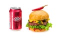 Burger with hot chili pepper and can of Dr. Pepper
