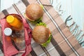 Burger with juice and picnic bag, top view with empty space for inscription