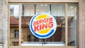 Burger King restaurant round logo sign, symbol, closeup, detail, building entrance, nobody, no people. Simple Burger King company