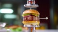 A burger in a laboratory test tube is decomposed into components. study of food and composition.