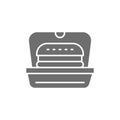 Burger in packing, fast food takeaway grey icon.