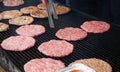 Burger patties preparation on barbecue grill at the Croatian street market