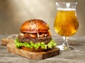 Burger and red beer Royalty Free Stock Photo