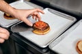 Burger Restaurant. Closeup Chef Cooking Burgers In Kitchen. Royalty Free Stock Photo