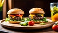 burger with tomato, lettuce and pickles on a wooden plate and french fries on the back Royalty Free Stock Photo