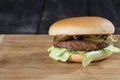 Burger on wooden table