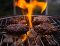 Burgers cooking on barbecue