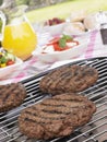 Burgers Cooking On Barbeque Grill Royalty Free Stock Photo