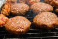 Burgers on a grill Royalty Free Stock Photo