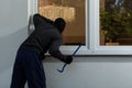 Burglar before burglary into the house Royalty Free Stock Photo