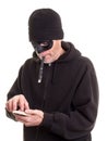 Burglar Counting Money Royalty Free Stock Photo