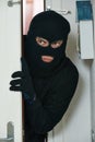 Burglar thief at house breaking Royalty Free Stock Photo