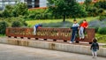 Children play on a sign in front of the Museum of Human Evolution in Burgos, Spain a museum on the subject of human