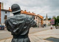 Statue of traffic police at Plaza de la Vega in Burgos , Spain with Arco de Santa Maria in background