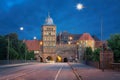 Burgtor - historic city gate at dusk in Lubeck, Germany Royalty Free Stock Photo