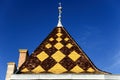 Burgundian tile - roof of the palace in the architectural style of Burgundy, region Beaujolais, France