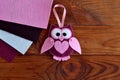 Burgundy and pink felt owl toy Royalty Free Stock Photo