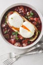 Burgundy Poached Egg in Red Wine Sauce on Toast Oeuf en Meurette closeup on the plate. Vertical top view Royalty Free Stock Photo