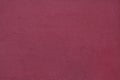 Burgundy red painted stucco wall. Background texture Royalty Free Stock Photo
