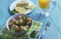 Burgundy snail on a wooden tray Royalty Free Stock Photo