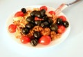 Burgur with chicken, olives and tomatoes