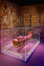 The burial chamber exhibits replicas of the sarcophagus and paintings