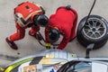 BURIRAM, THAILAND - JANUARY 7, 2017: Technicians changing tire