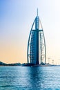 Burj al Arab in evening light, Dubai. Famous Hotel Burj al Arab with light orange evening sky