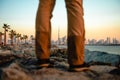 Burj Khalifa, Dubai Cityscape through the legs of tourist, UAE Royalty Free Stock Photo