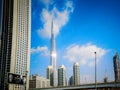 Burj Khalifa tower in Dubai against beautiful clouds and blue sky Royalty Free Stock Photo
