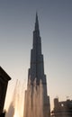 The Burj Khalifa Tower and the Dubai Fountain during sunset