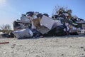 Local dump overflowing from Christmas trash and waste close up ground view