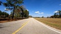 POV driving country low to the ground fall season brown wooden fence