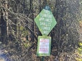 A rural county public waste trash dump for local residents dumping sign