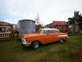 Burkes Pass, New Zealand - 2023: Old vintage retro orange Chevrolet classic car in Burkes Pass Village outdoor museum Royalty Free Stock Photo