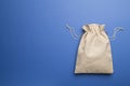 Burlap eco sack on color background, top view Royalty Free Stock Photo