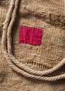 Burlap with red patch Royalty Free Stock Photo