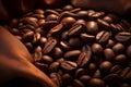 Burlap sack of coffee beans against dark wood background with whole coffee beans spilling out over wood panel Royalty Free Stock Photo