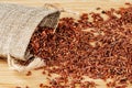 Burlap Sack of delicious and healthy Red Rice Royalty Free Stock Photo