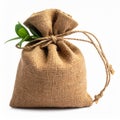 Burlap Sack with Fresh Green Leaves on White Background Studio Shot Royalty Free Stock Photo